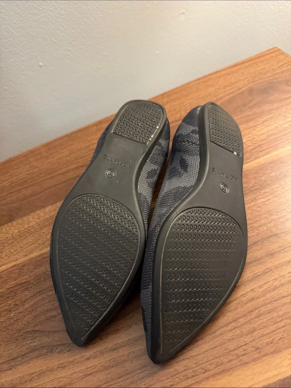 Rothy's Pointed Knit Flats in Black and Gray with Blue Trim